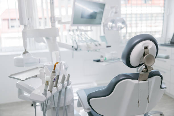 modern dental drills and empty chair in empty dentist's office