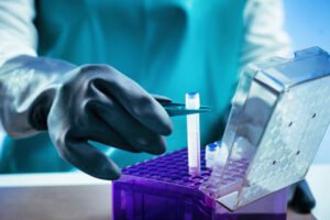 biobanking. technician preparing biological sample for deep freezing