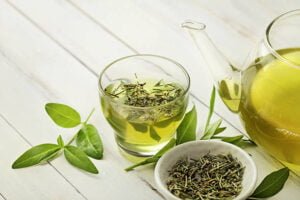 tea cup with tea leaves